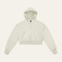 Cropped Hoodie in Bone laid flat, front view showing the full-length zip, hood and front pockets